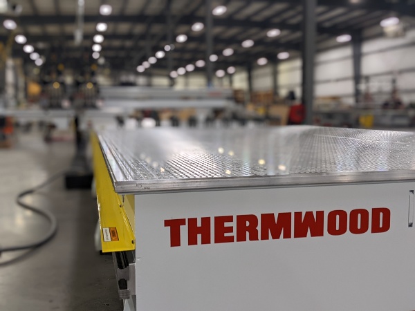 Dual 7'x12' fixed aluminum tables with gridded tops