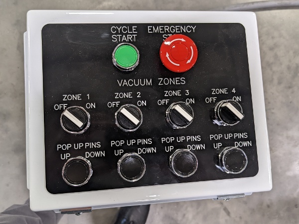 Remote pedestal for controlling pop up pins and vacuum work zones.