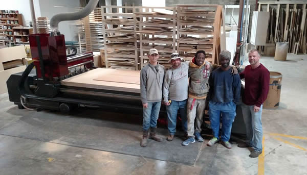 Larry Crutchfield and the guys of Alpha Woodworks with their Thermwood Cut Center