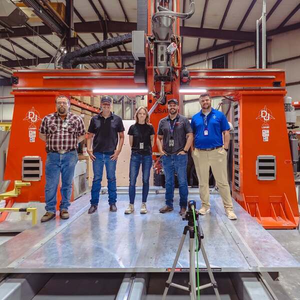 The crew at D-J Engineering with their Thermwood LSAM MT 1010