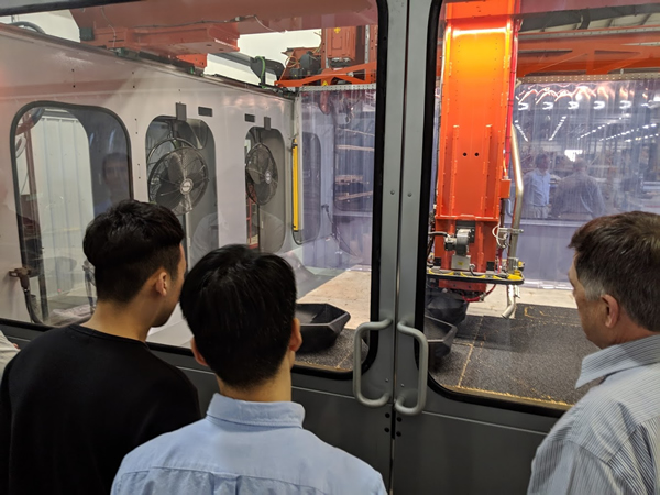 Thermwood personnel, domestic and international dealers attend an LSAM demonstration on our trainer machine during the 2019 Dealer Conference.