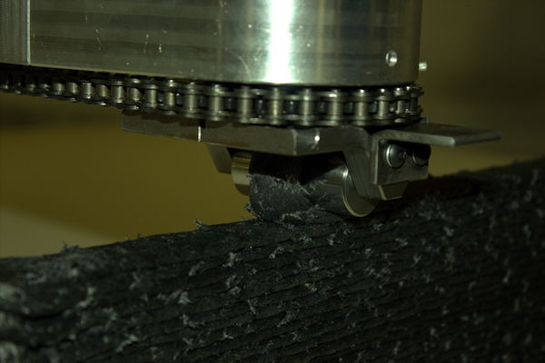 Thermwood’s MeltShape wheel is servo controlled to precisely follow machine motion. Thermwood’s MeltShape wheel is servo controlled to precisely follow machine motion.