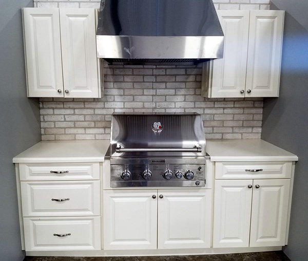 Outdoor Cabinets with grill and hood installed