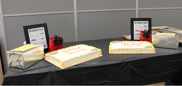 Cakes and gifts celebrating Becky and Dennis' many years of service